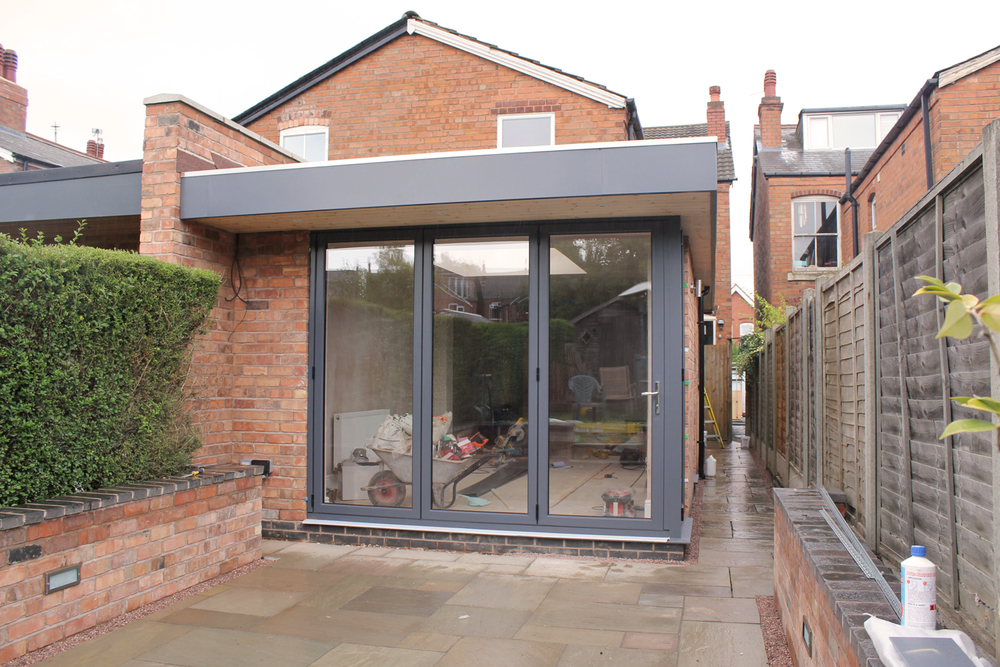 Surveyor inspecting steel beam Bromley installation on site